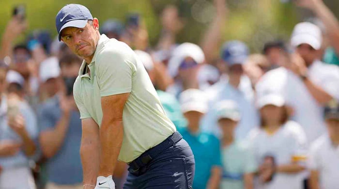 Rory McIlroy prepares for a shot on the 9th tee during the final round of the 2024 Players Championship at TPC Sawgrass  in Ponte Vedra Beach, Fla.
